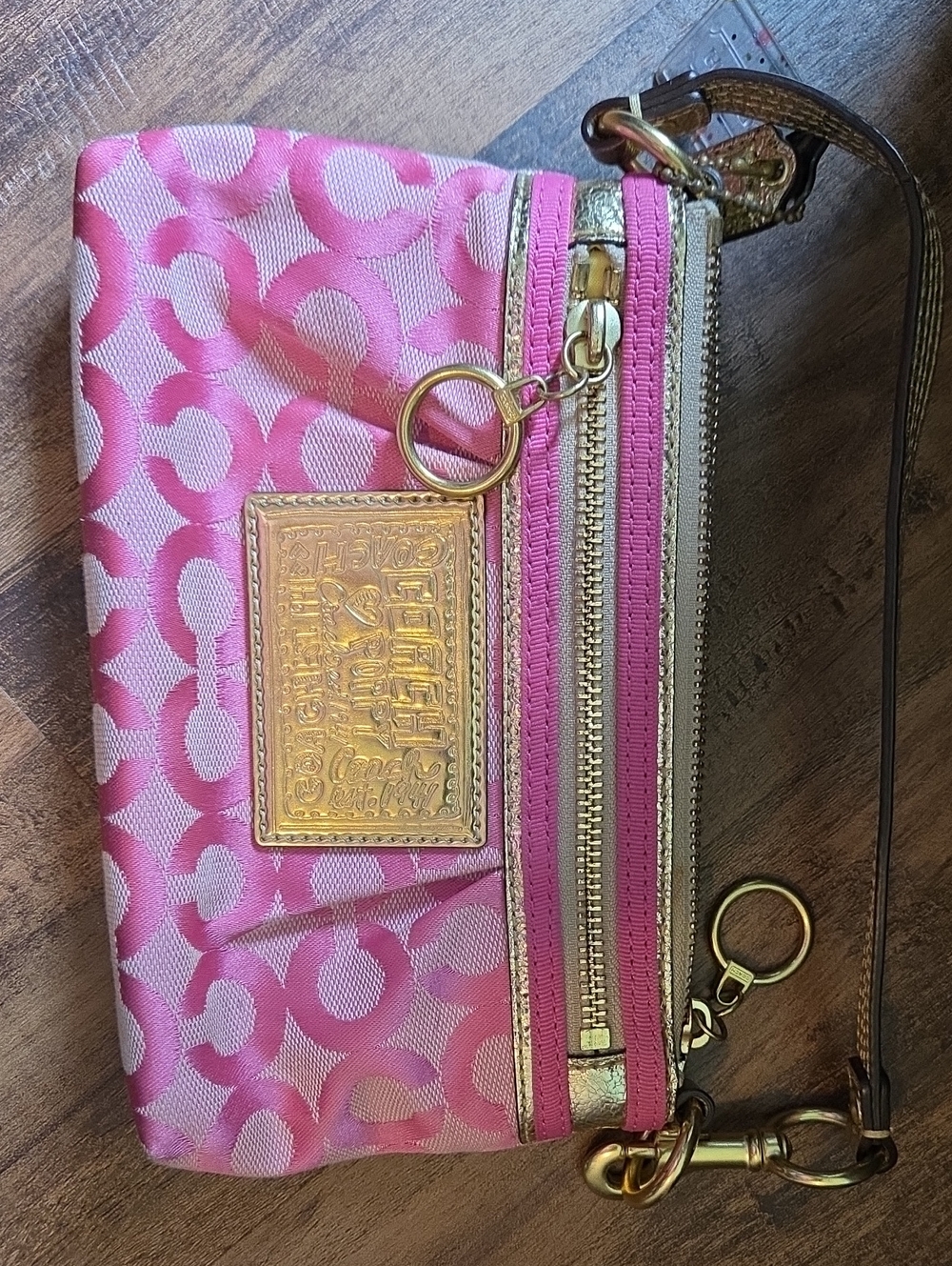 Coach Pink Signature Canvas Wristlet with Gold Plaque